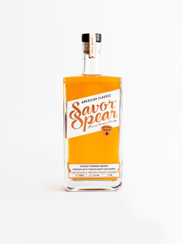 A bottle of Savor Spear Classic American Bourbon sits on a clean white backdrop